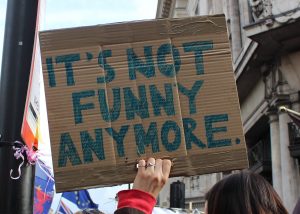 Placard saying It's not funny any more