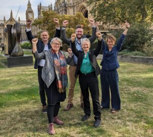 Pete Kennedy with Green peers Natalie Bennett and Jenny Jones and other campaigners, outside Parliament